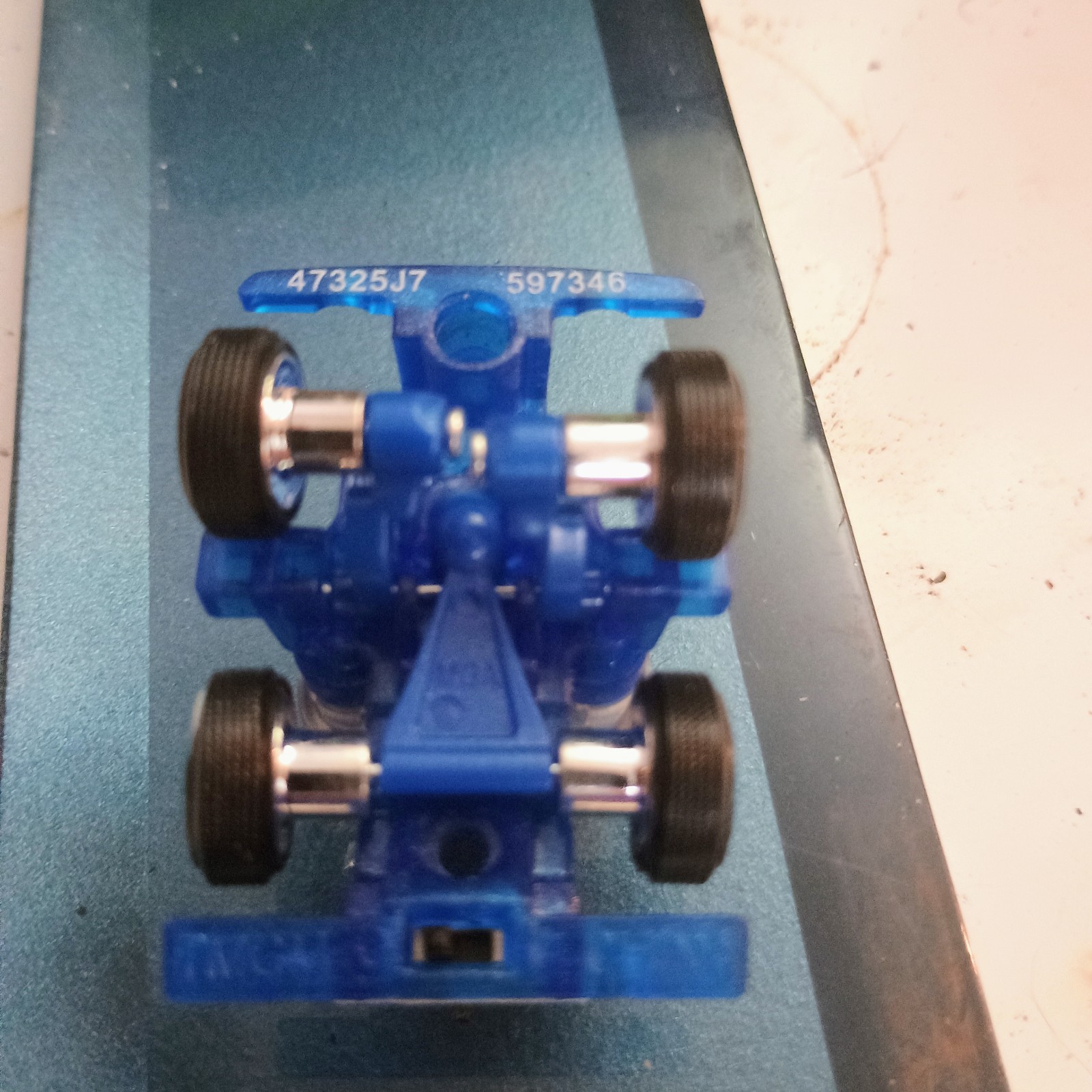 1:64 Scale Posable Lowrider Chasis w/blue L.E.D Light simulates hydraulics hw mb
