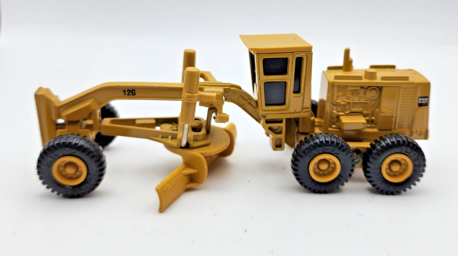 Vintage 1990s ERTL Caterpillar 12G Road Grader 1:64 Diecast.