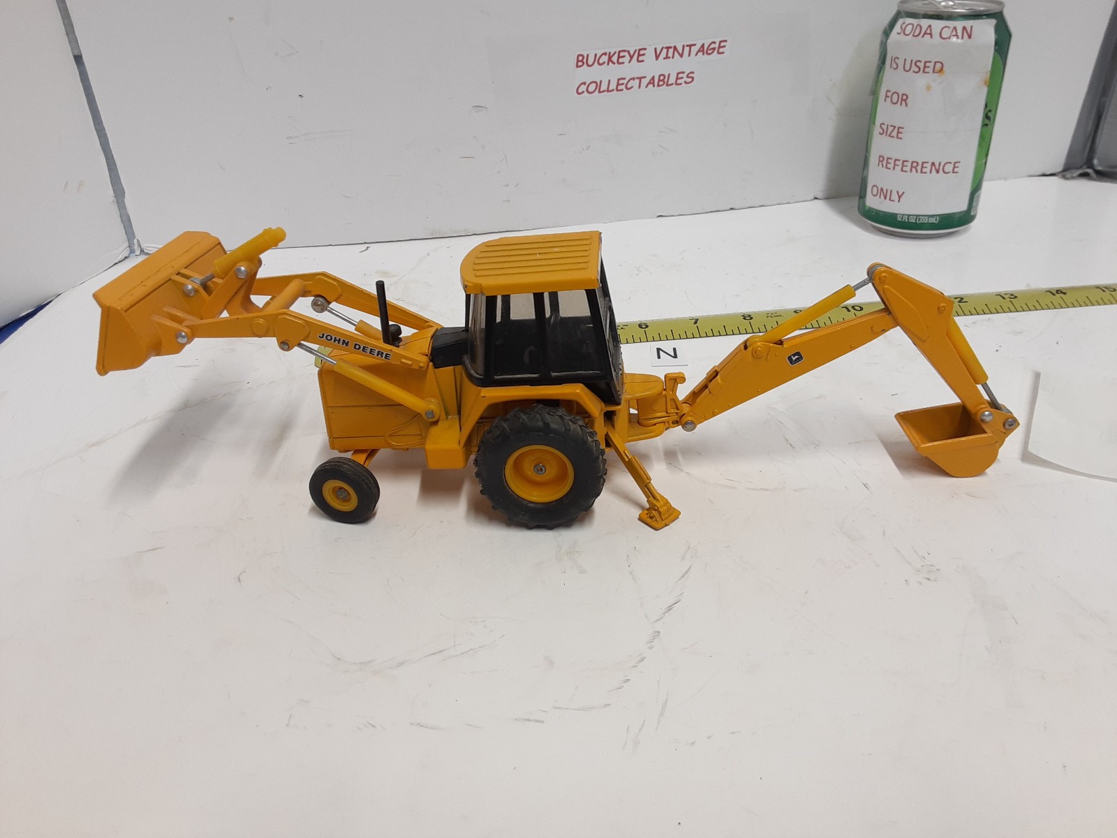Ertl ~John Deere 310D Backhoe/Loader Yellow, 1:32 Scale No Box