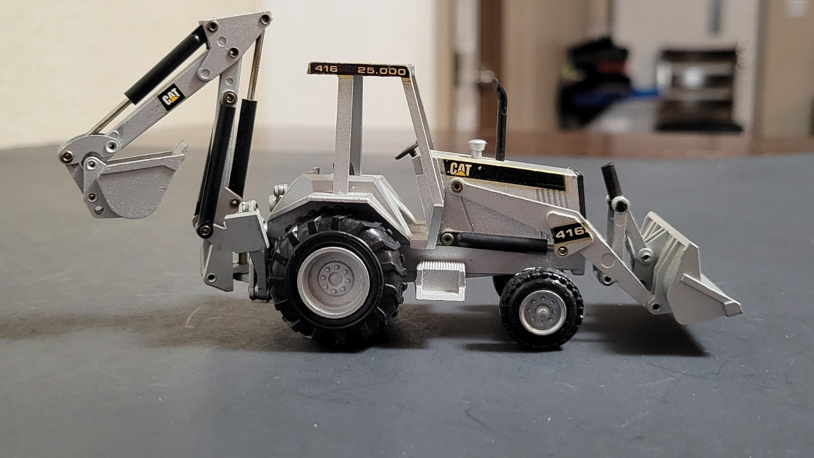 1:50 Scale Diecast CAT 416 Backhoe Loader- SILVER Limited Edition – NZG 285