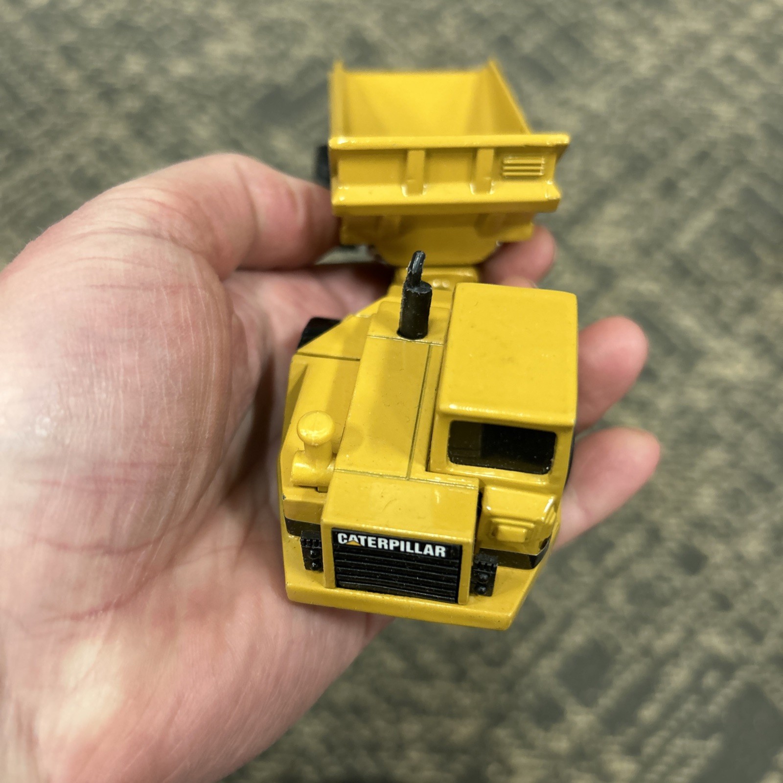 Caterpillar Diecast D25D Articulated Dump Truck