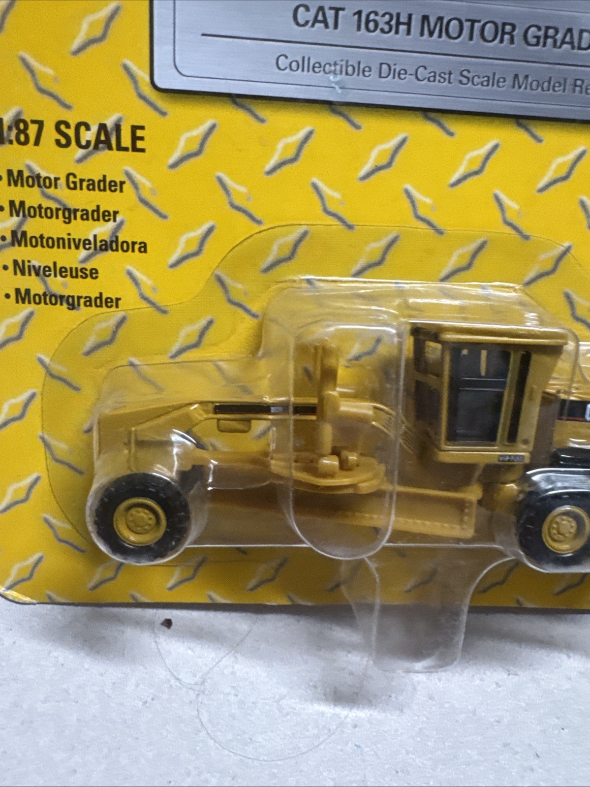 NIB 2005 CAT 163H MOTOR GRADER CONSTRUCTION 1/87 NORSCOT DIECAST TOY #55403