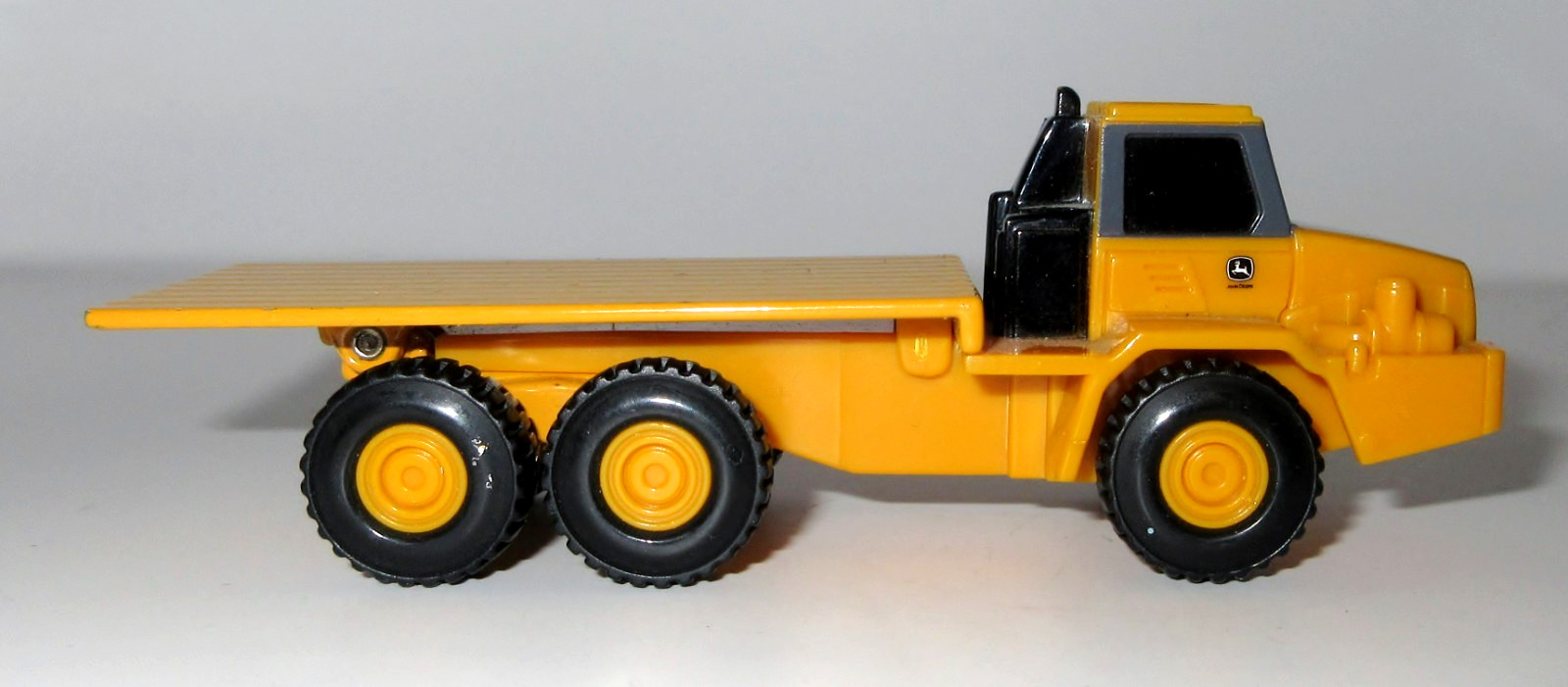 ERTL John Deere Flat Bed Mining Hauler Truck 4.5″ Long / Bed Goes Up / Good Cond