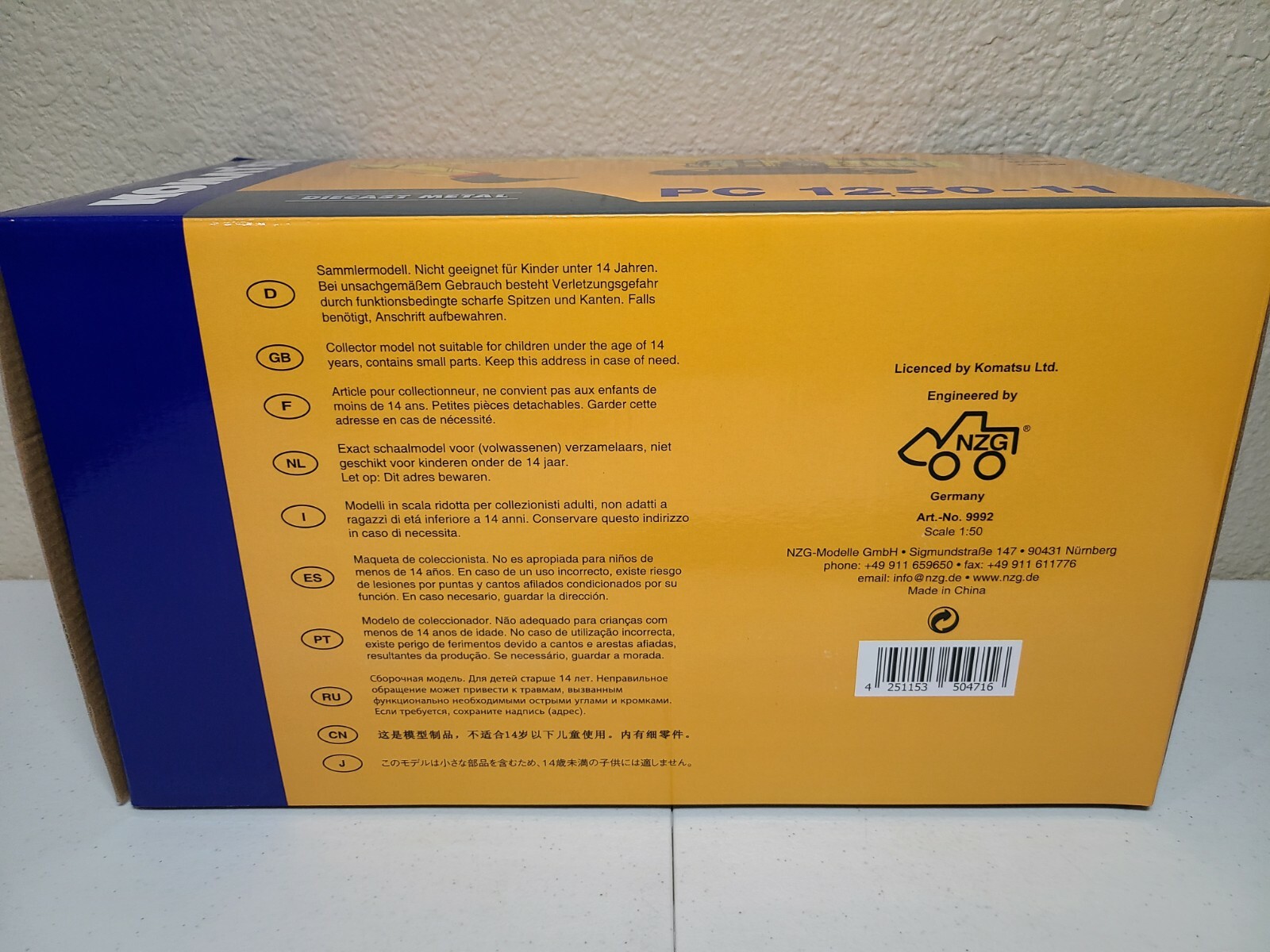 Komatsu PC1250-11 Excavator Quick Coupler – Yellow – NZG 1:50 Scale #9992 New