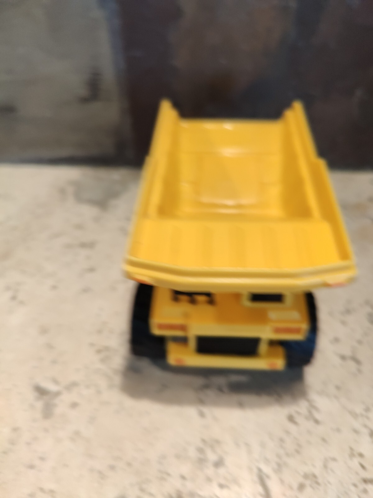 Yellow DIG 2500 Dump Truck With Sound & Lights working 3″ tall x 4.5″ long