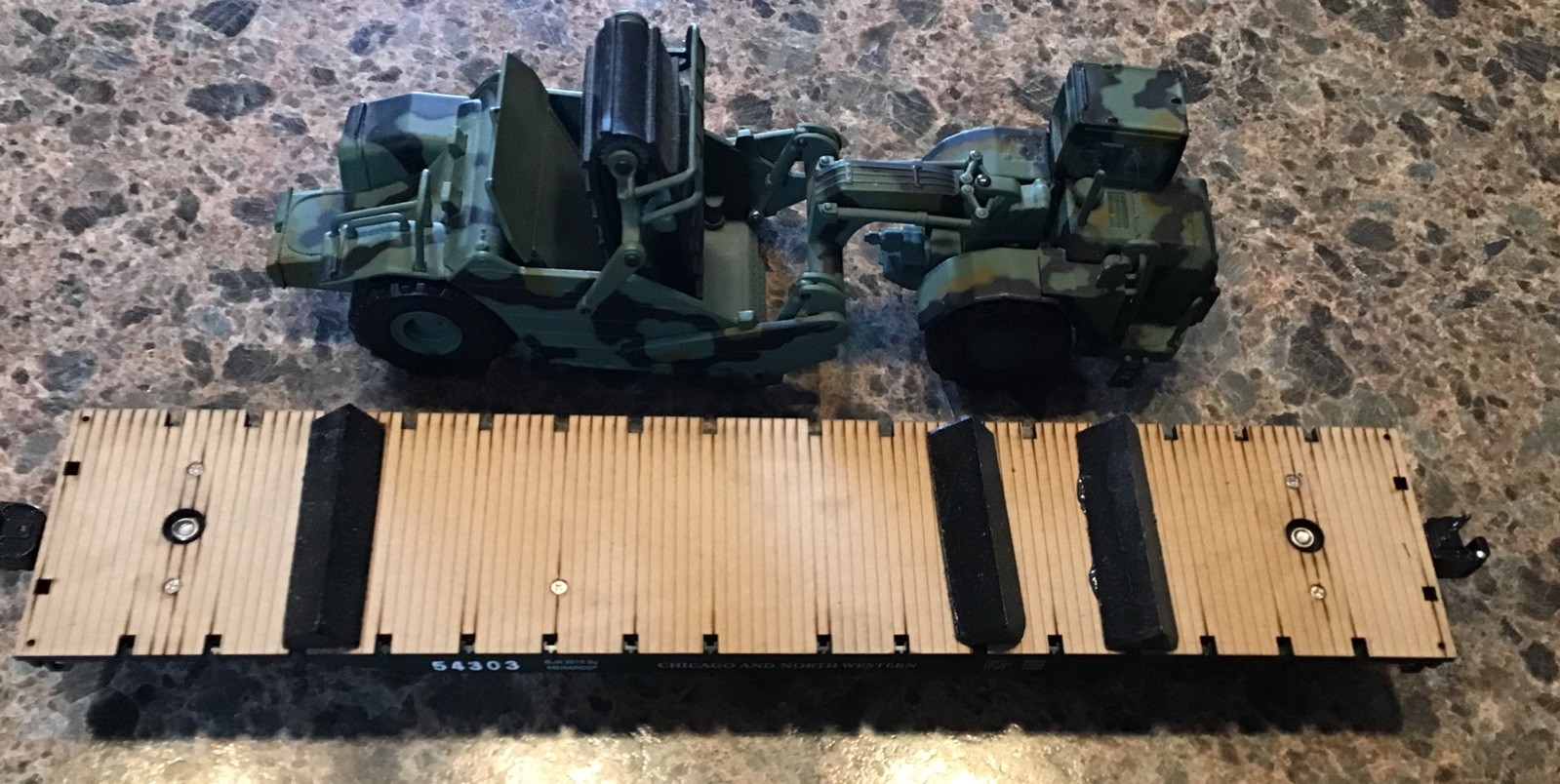 Norscot Caterpillar 623G Military Elevating Scraper & CNW Menard Flatbed Trailer