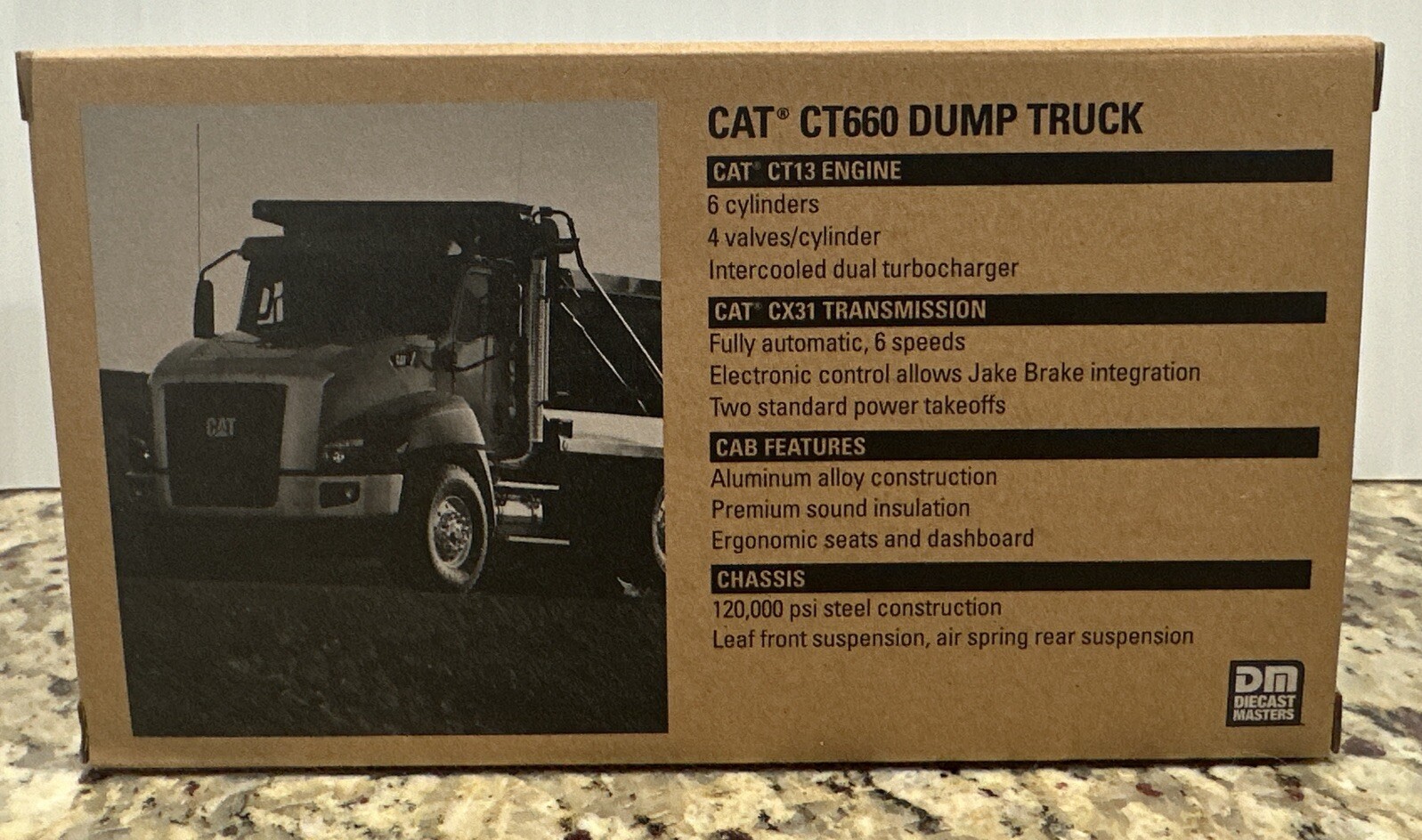 2015 DIECAST_MASTERS – CAT Core Classics CT660 Dump Truck Red 1:50 Scale