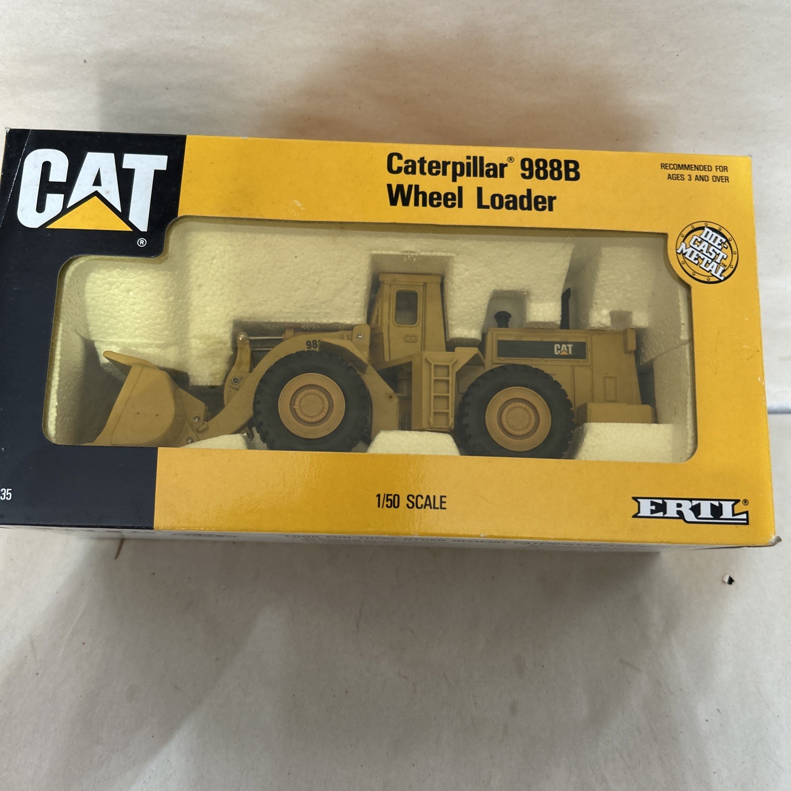 Ertl 2435 1:50 scale die-cast model of a Caterpillar 988B Wheel Loader. Box 4