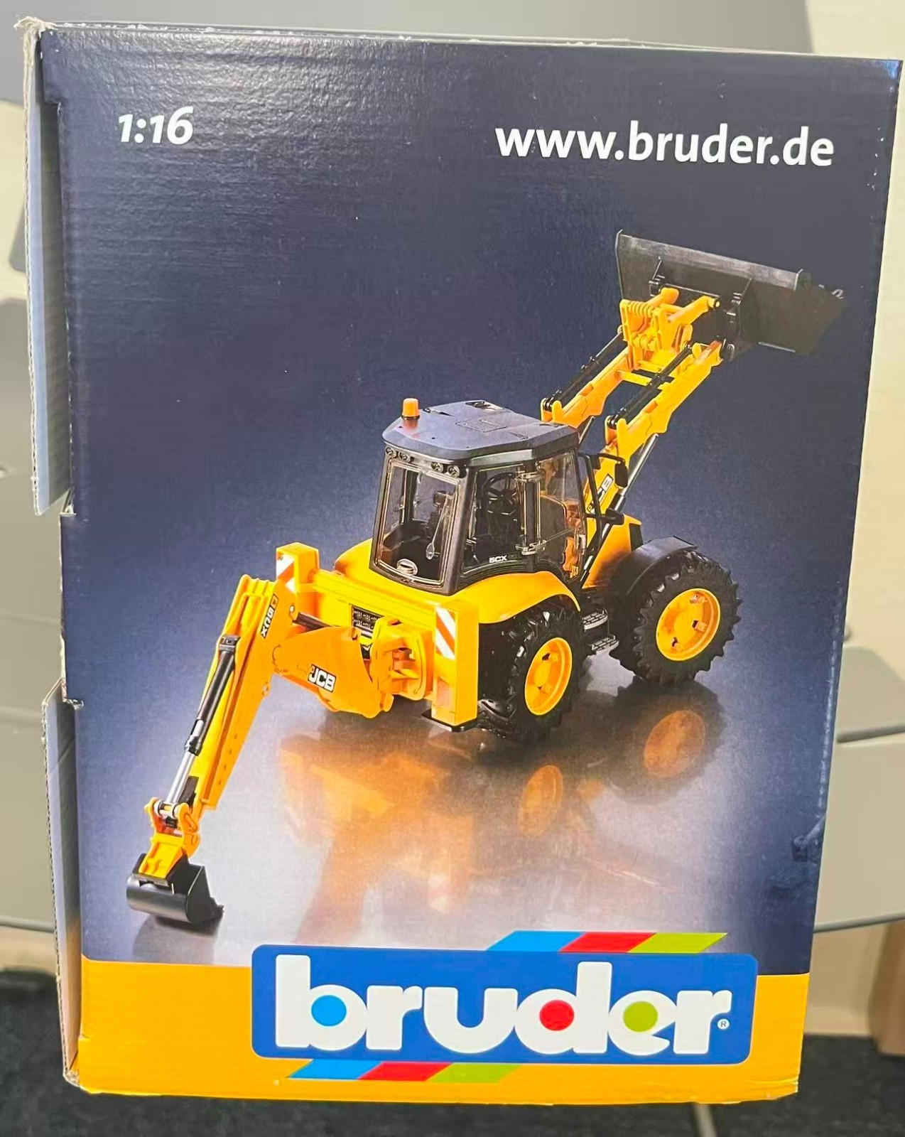 JCB 5CX Eco Backhoe Loader (model 02454) designed to a 1:16 scale Toy