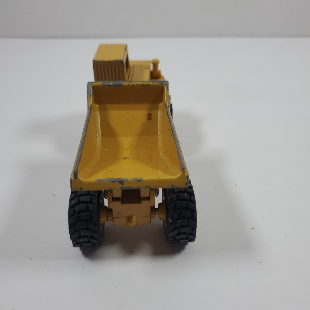 Caterpillar D25D Articulating Dump Truck 1/64 Diecast Cat Brand Pre-owned no box
