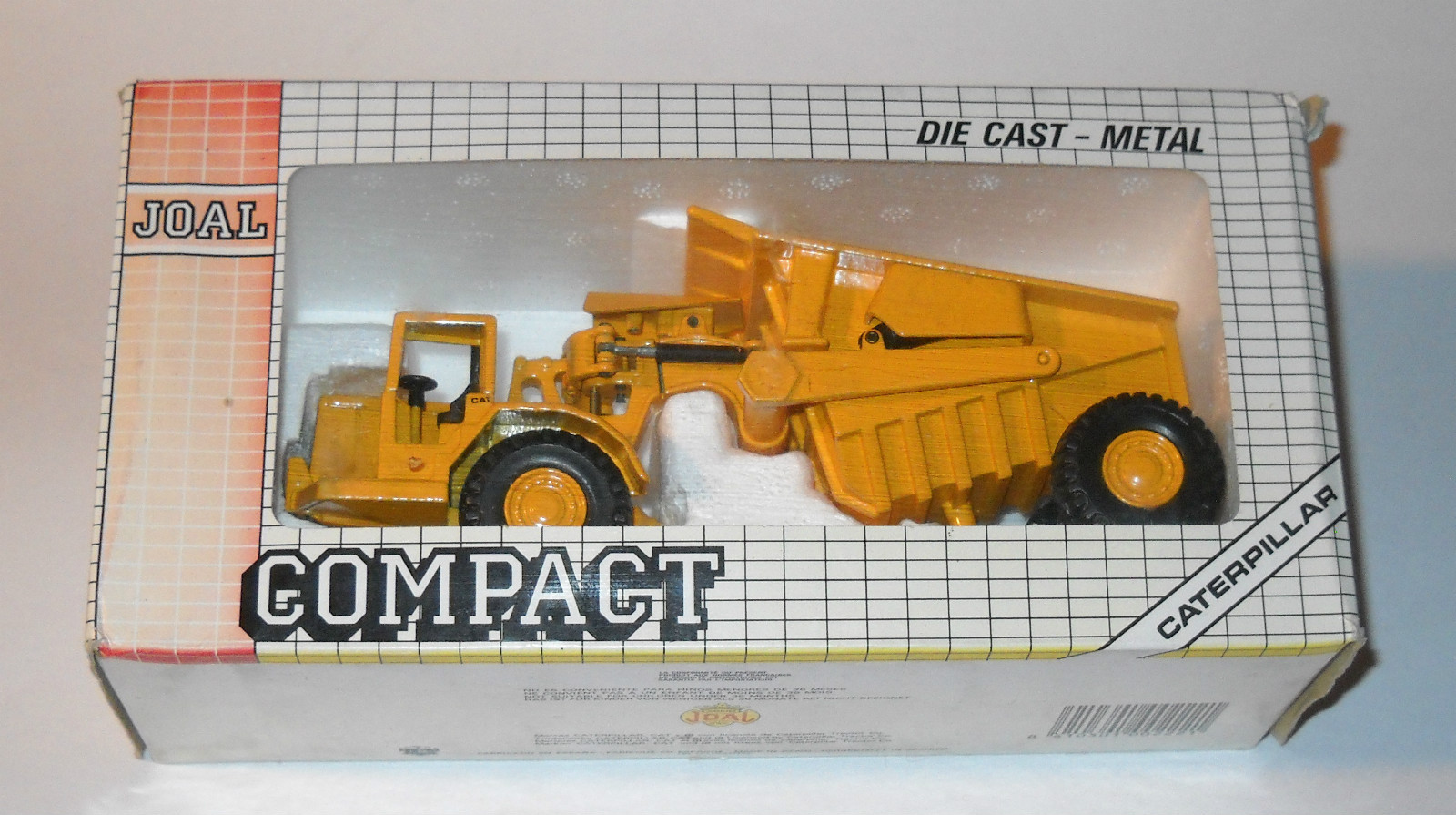 Joal Compact Caterpillar Tractor Cat 631 with Tipper Scale 1:70 Die Cast NIB