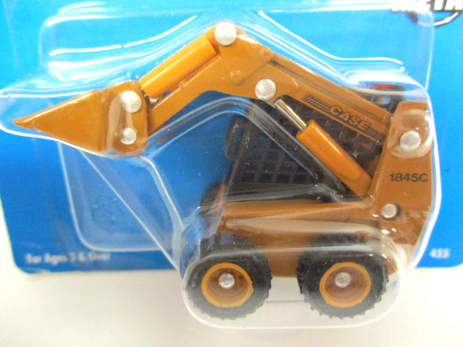 ERTL – CASE 1845C UNILOADER SKID STEER LOADER – 1/64 DIECAST