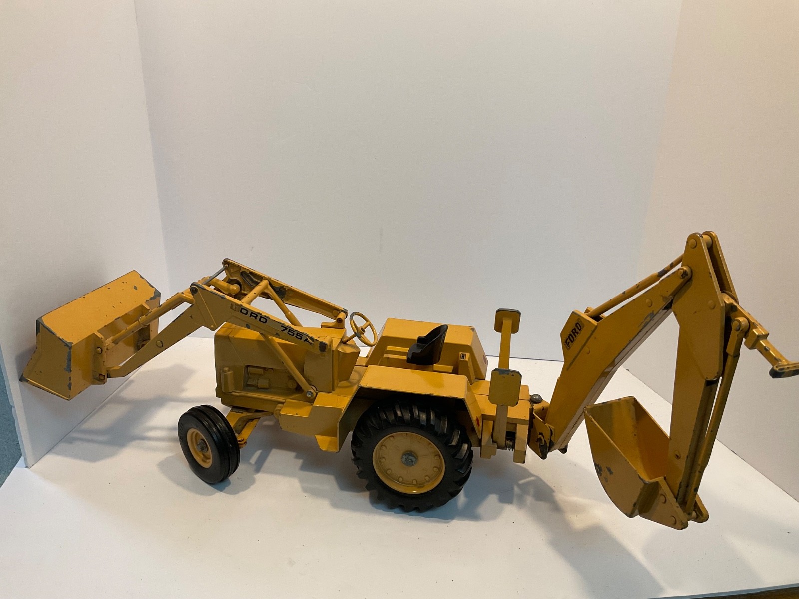 Vintage Ertl Ford 755A Backhoe Loader 1/12 for parts or restoration.