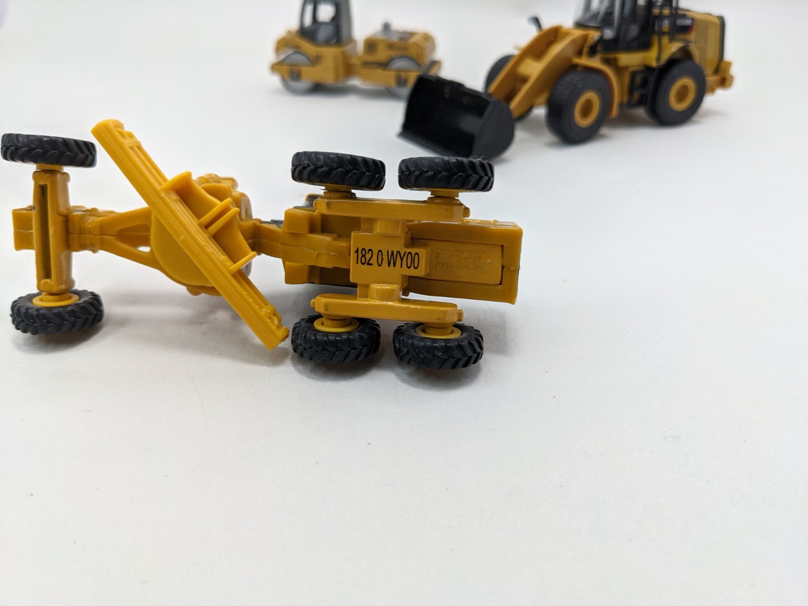 Ertl John Deere Road Scraper , HD Cat Loader, Hot Wheels Steam Press Lot Of 3