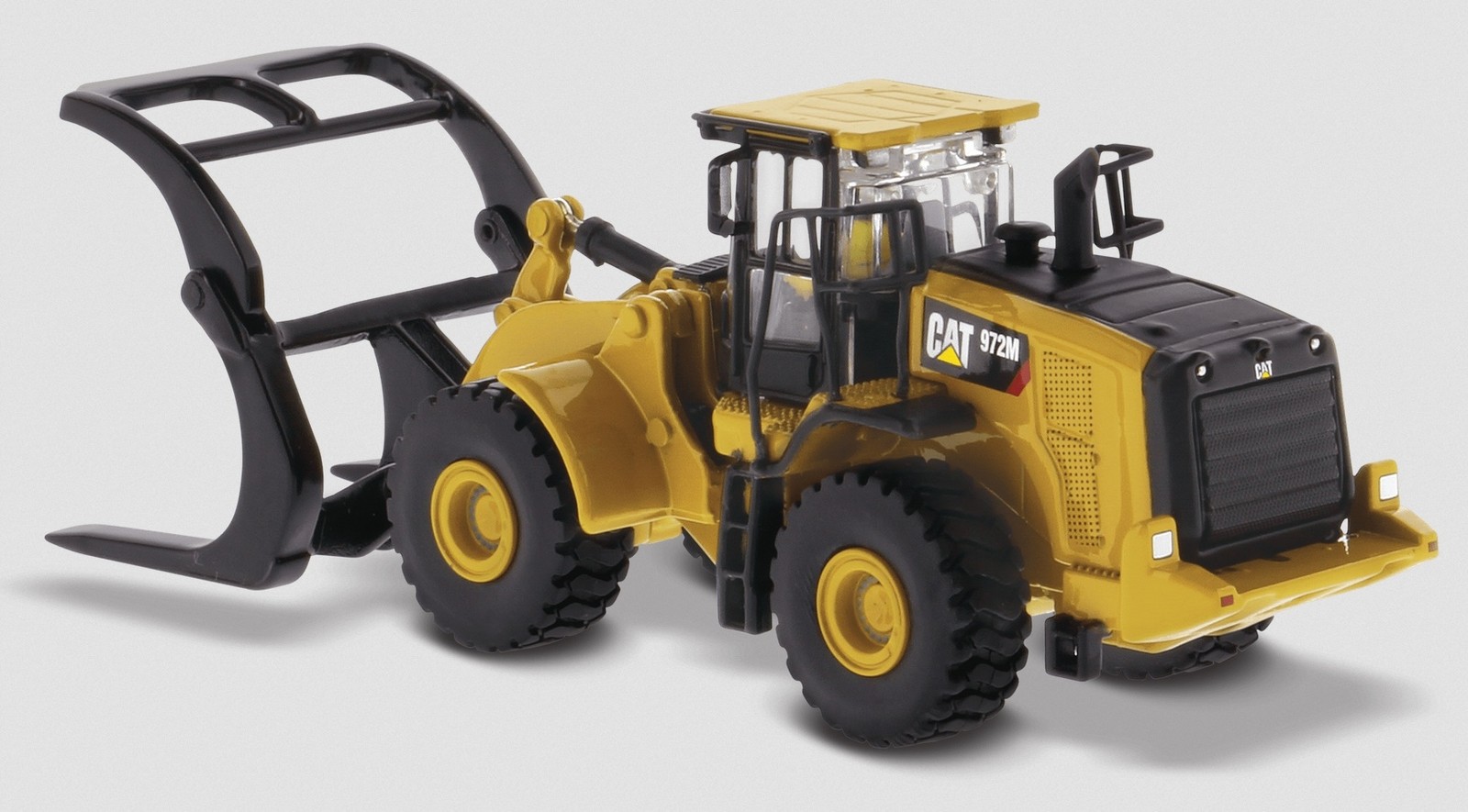 DIECAST MASTERS,CATERPILLAR 972M loader with log grapple, 1/87, DCM85950