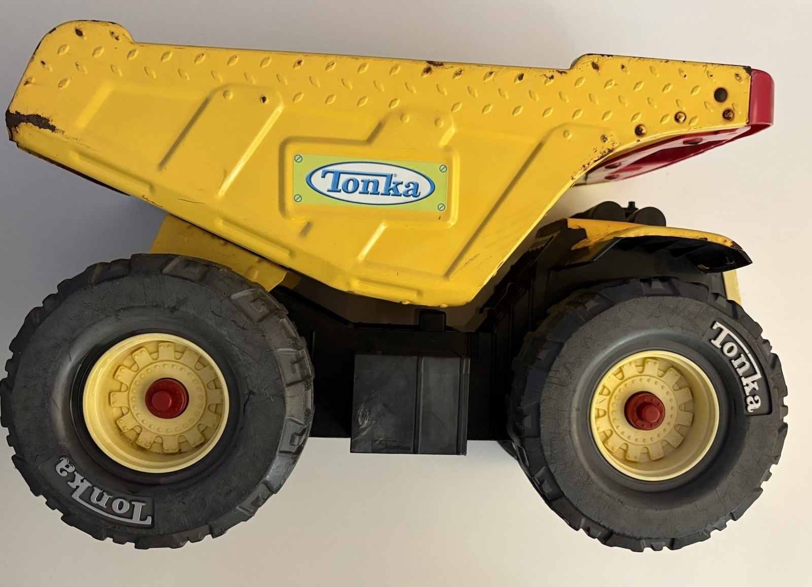 Tonka Yellow Dump Truck Construction Vehicle Toy w/ Red Handle, Black & Red