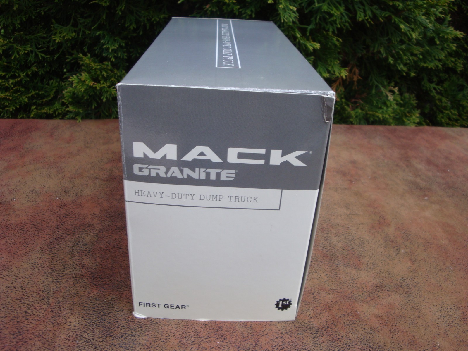 Mack Granite Heavy-Duty Dark Green Dump Truck- 1:34 scale by First Gear (2003)