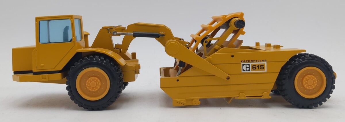 NZG 260 1:50 Scale Die-Cast CAT 615C Wheel Tractor with Elevating Scraper EX
